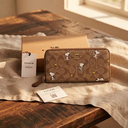 Coach X Peanuts Snap Wallet In Signature Canvas With Snoopy Print CBN32